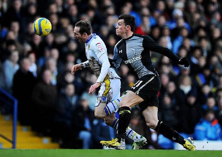 LEEDS, ENGLAND - JANUARY 27: Aidan White of Leeds and Gareth Bale of Spurs compete for the ball during the FA Cup with Budweiser Fourth Round match between Leeds United and Tottenham Hotspur at Elland Road on January 27, 2013 in Leeds, England.  (Photo by Laurence Griffiths/Getty Images)